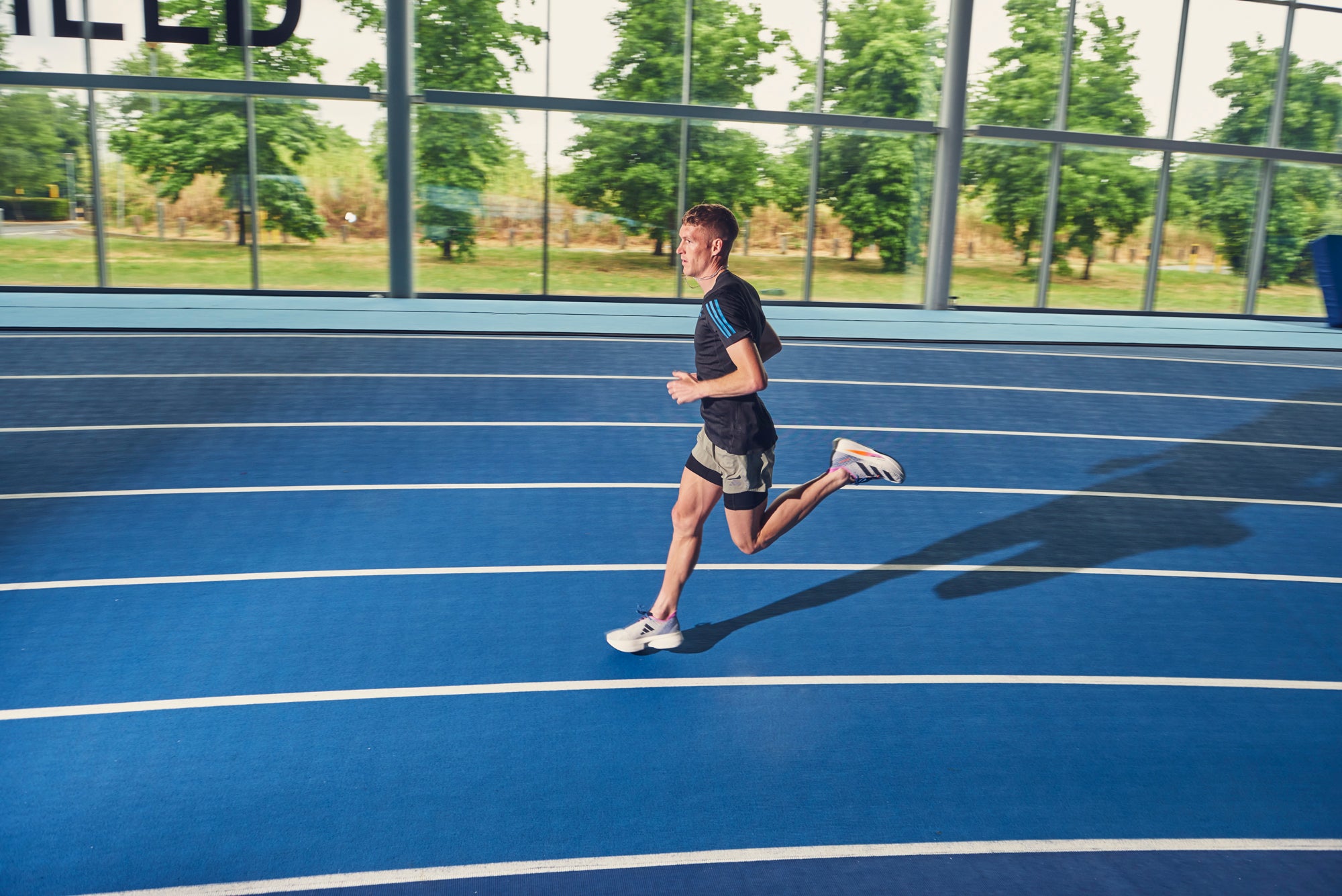 man-running-on-indoor-track